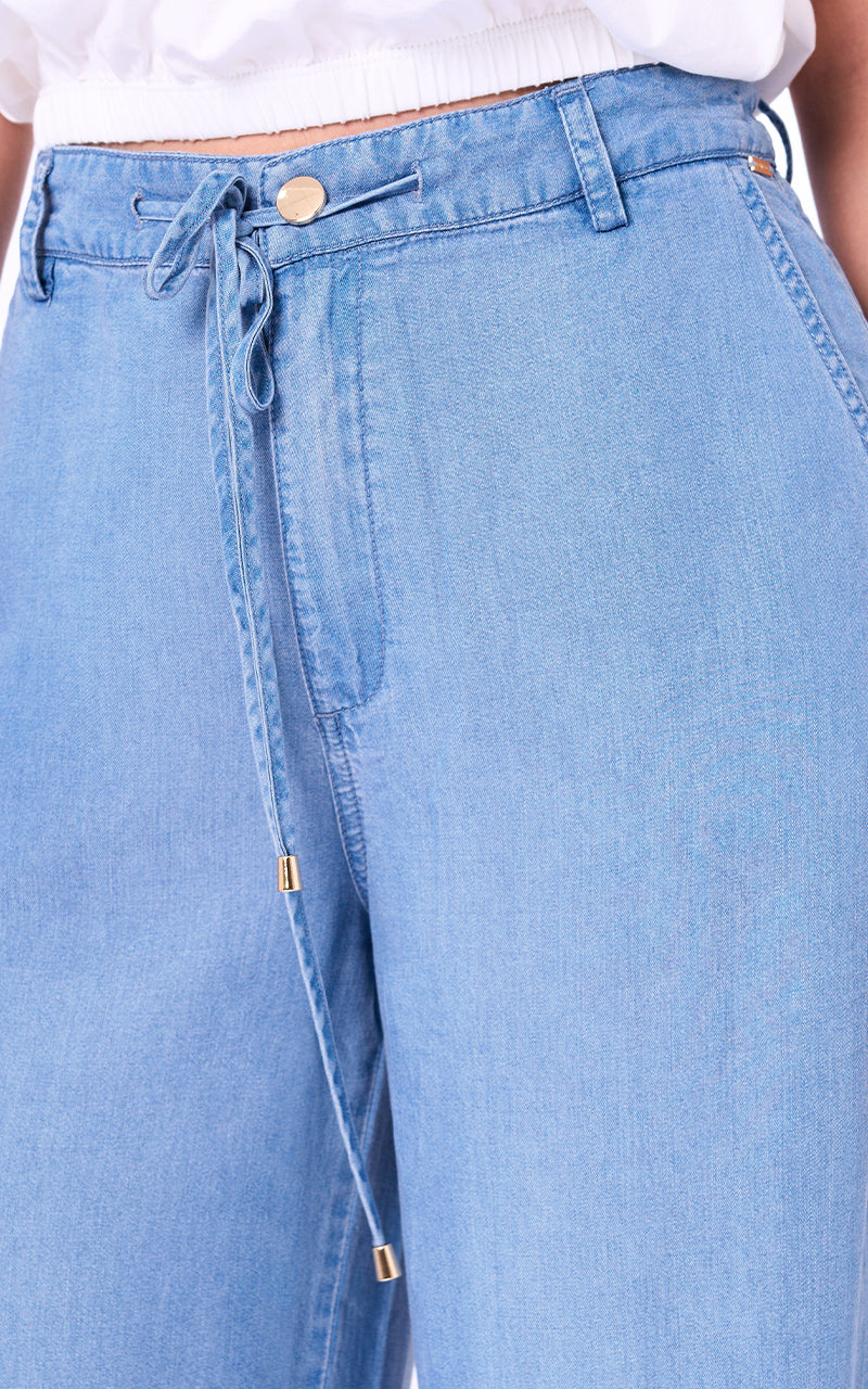 CONJUNTO CHALECO UNICOLOR SIN MANGAS